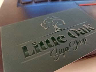 Closeup of business card of Little Oak Sign Shop